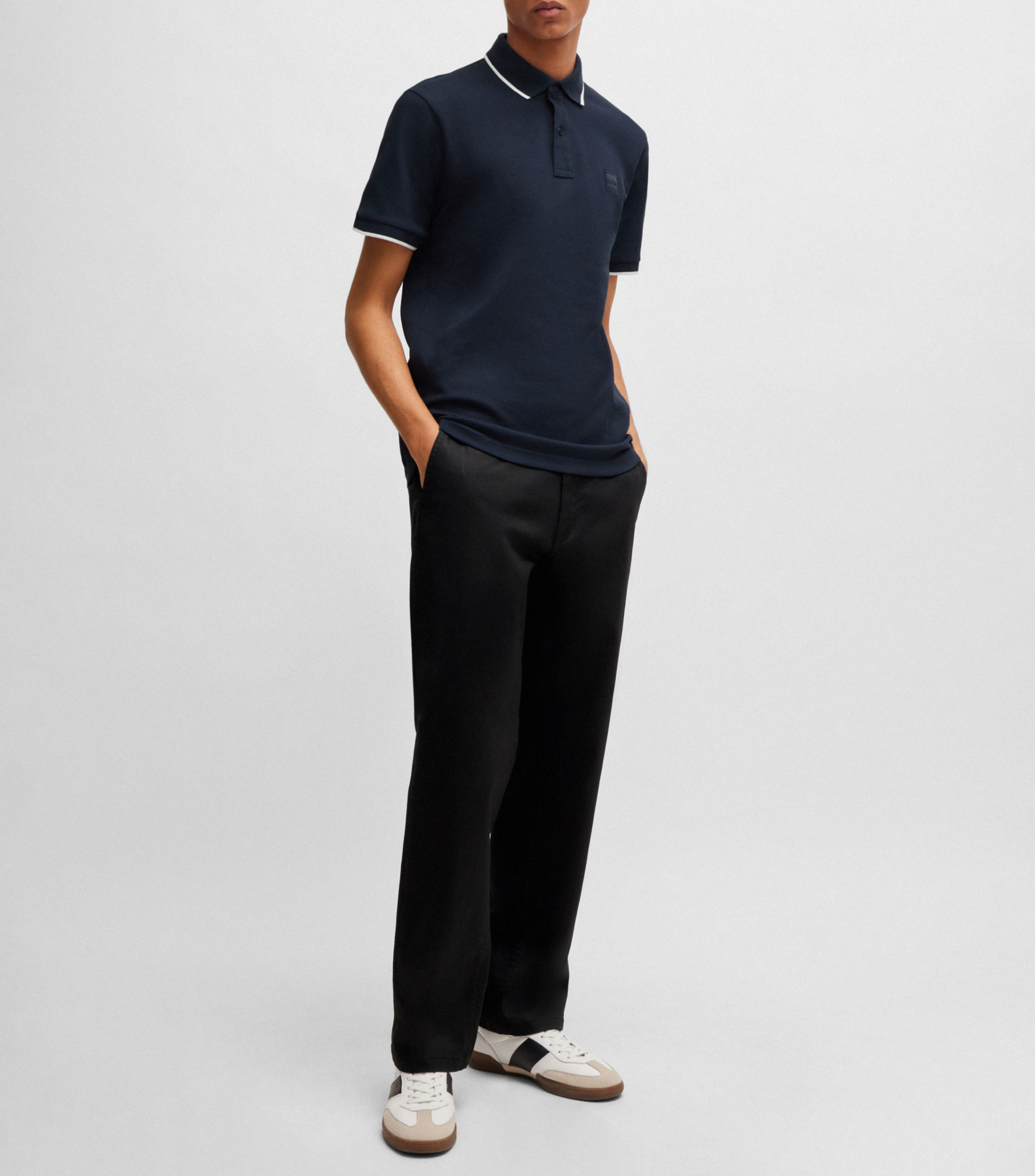 Playera polo de corte ajustado en pique de algodon elastico lavado Hombre